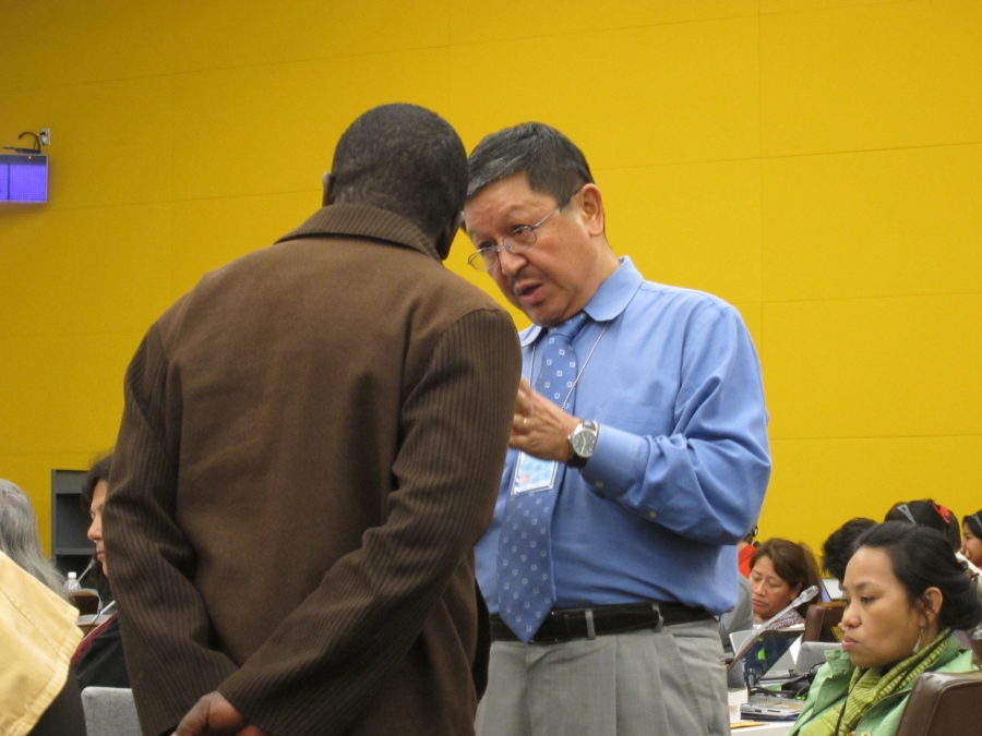 Navin Rai (right), the World Bank's top advisor on indigeneous peoples affairs from 2000 to 2012, talks with a member of the United Nations Permanent Forum on Indigenous Issues during a conference. Navin Rai (right), the World Bank's top advisor on indigeneous peoples affairs from 2000 to 2012, talks with a member of the United Nations Permanent Forum on Indigenous Issues during a conference.